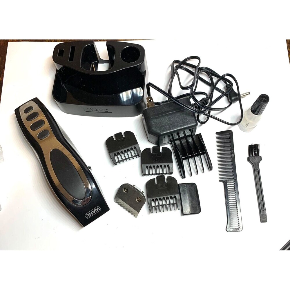 Wahl Hair Clippers Small with Attachments as Shown in Photos